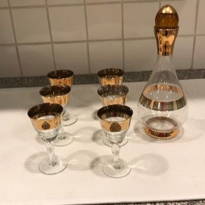 A set of wine cups and pitcher